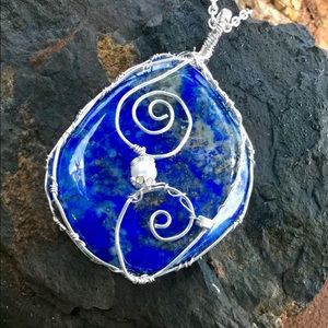 Natural Lapis pendant in a fine silver frame